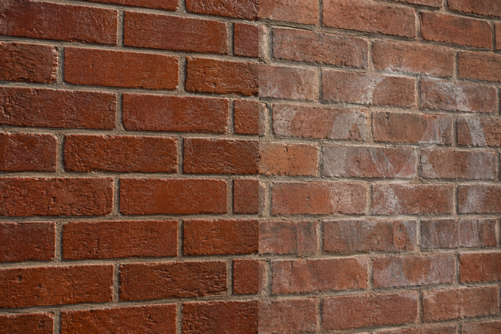 Brick wall with clear anti-graffiti coating beside untreated bricks